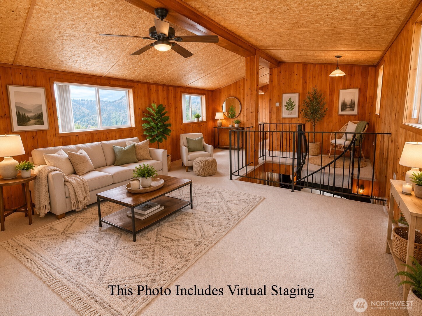 41238 Sterling Valley Road North Lincoln, WA 99147 - Photo 19 of 39 a living room with furniture a ceiling fan and a window