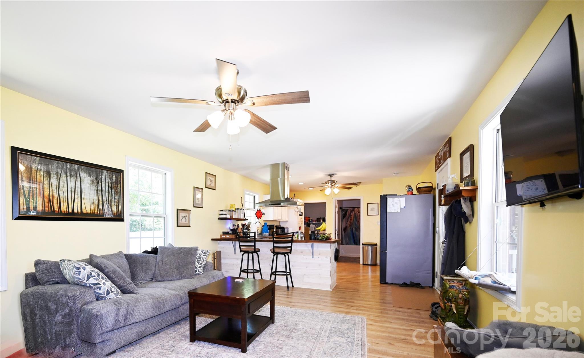1845 State Rd S-46-149 Clover, SC 29710 - Photo 12 of 28 a living room with furniture kitchen view and a flat screen tv