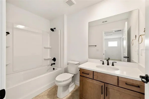 a view of a city with an ocean view