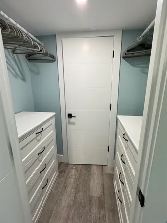 a view of an empty walk in closet