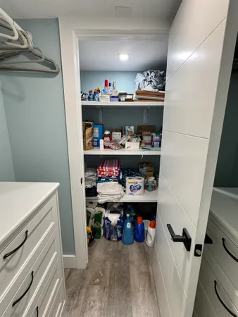 a room with storage and utility