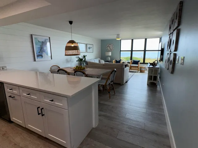 a view of living room with furniture and window