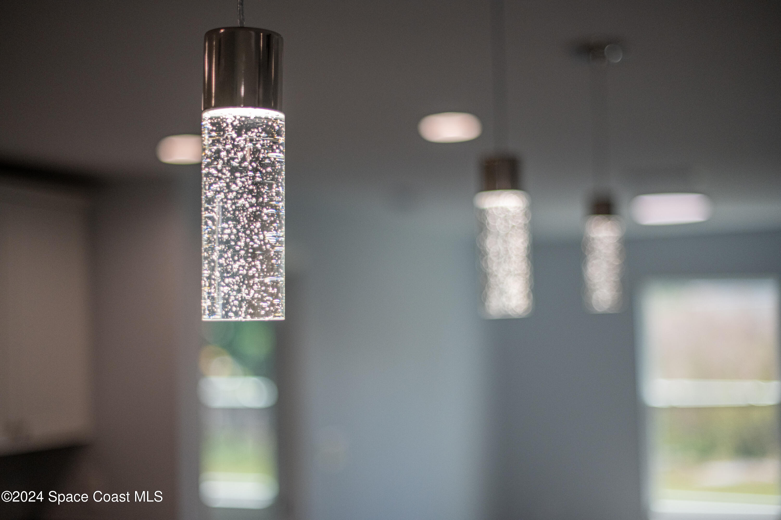 1247 Hathaway Road Southwest Palm Bay, FL 32908 - Photo 19 of 38 19. Kitchen Island Lights Detail
