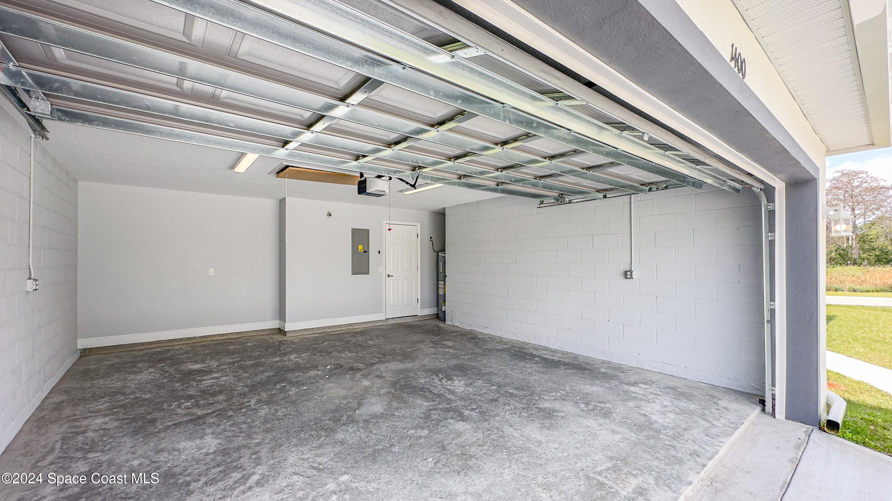1247 Hathaway Road Southwest Palm Bay, FL 32908 - Photo 37 of 38 37. 2 Car Garage
