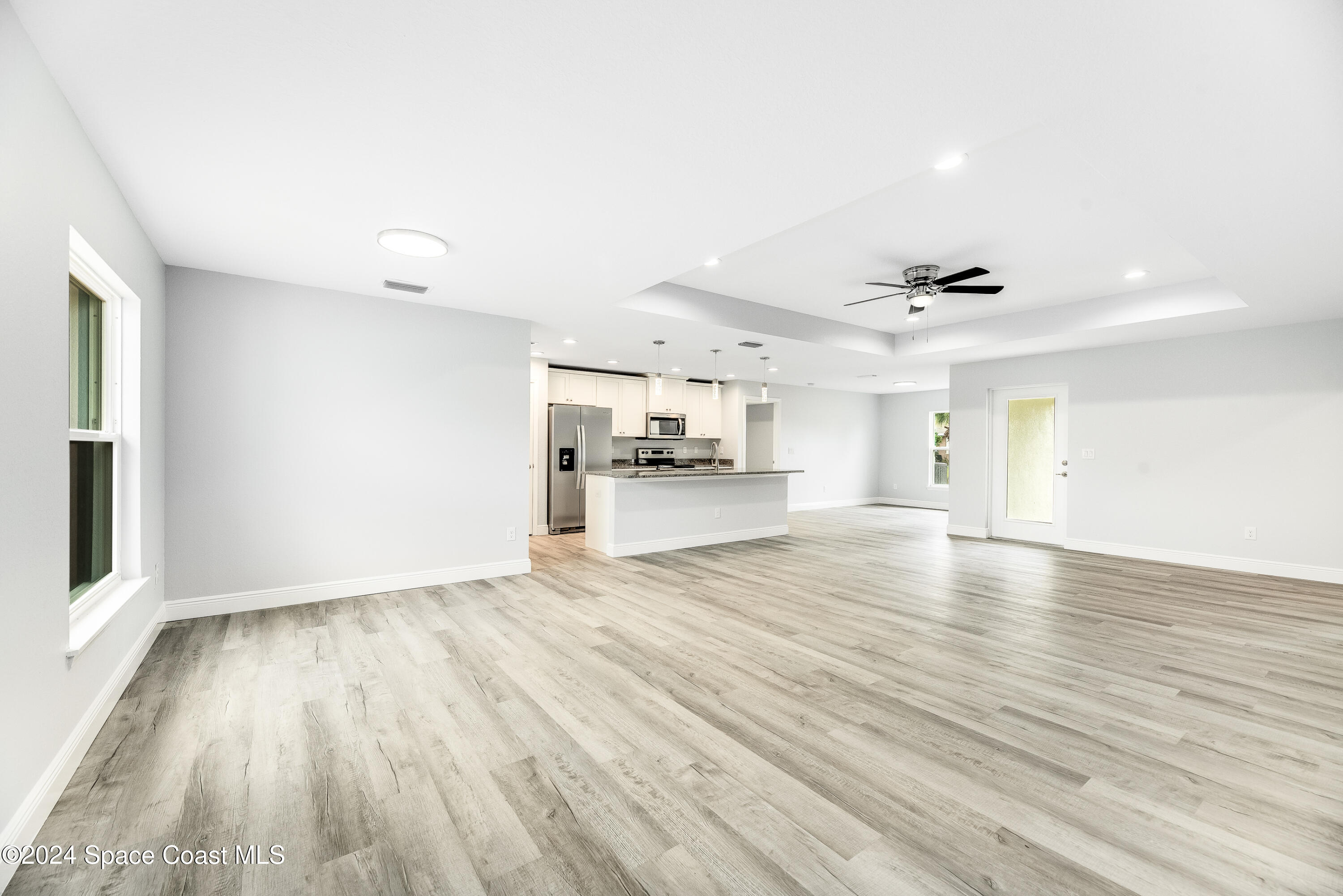 1247 Hathaway Road Southwest Palm Bay, FL 32908 - Photo 7 of 38 7. Living:Kitchen:Dining