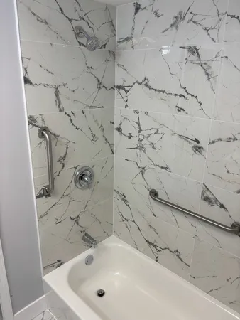 a view of a house with a white roof