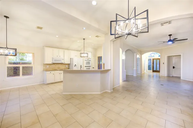 a view of a room with a windows