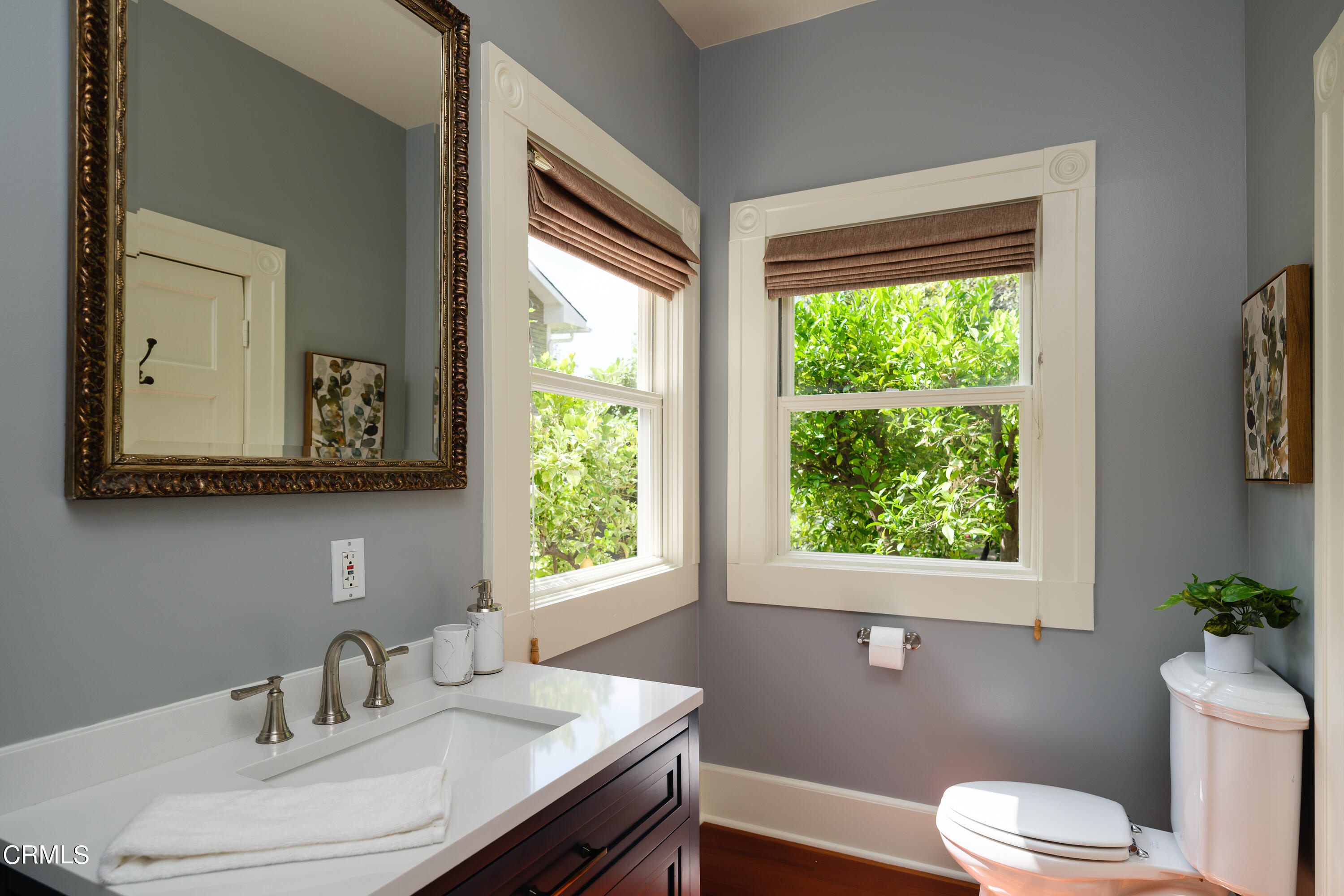 2020 Minoru Drive Altadena, CA 91001 - Photo 16 of 75 a bathroom with a toilet sink and mirror