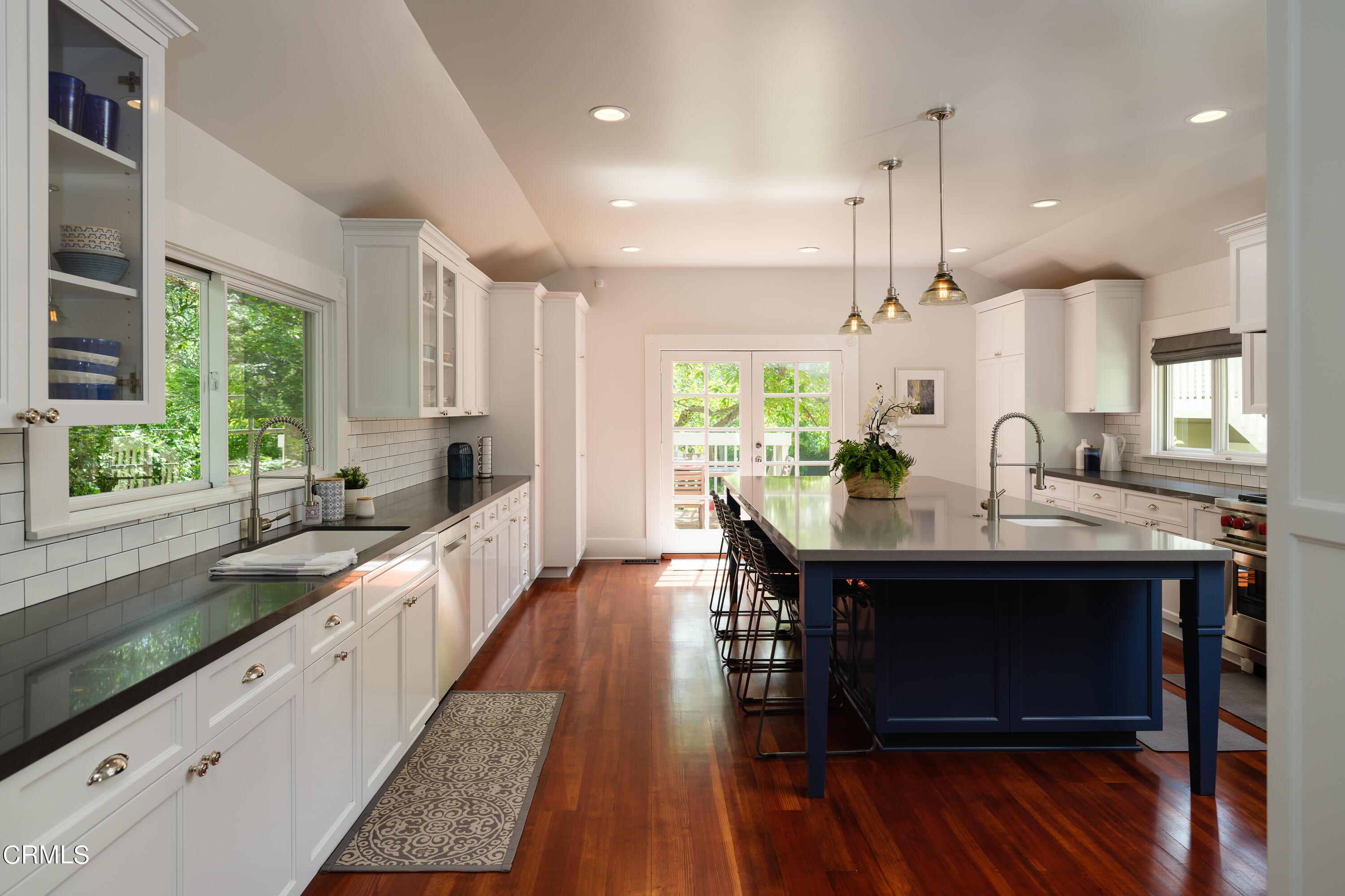 2020 Minoru Drive Altadena, CA 91001 - Photo 24 of 75 a kitchen with stainless steel appliances granite countertop a sink a stove and a wooden floors