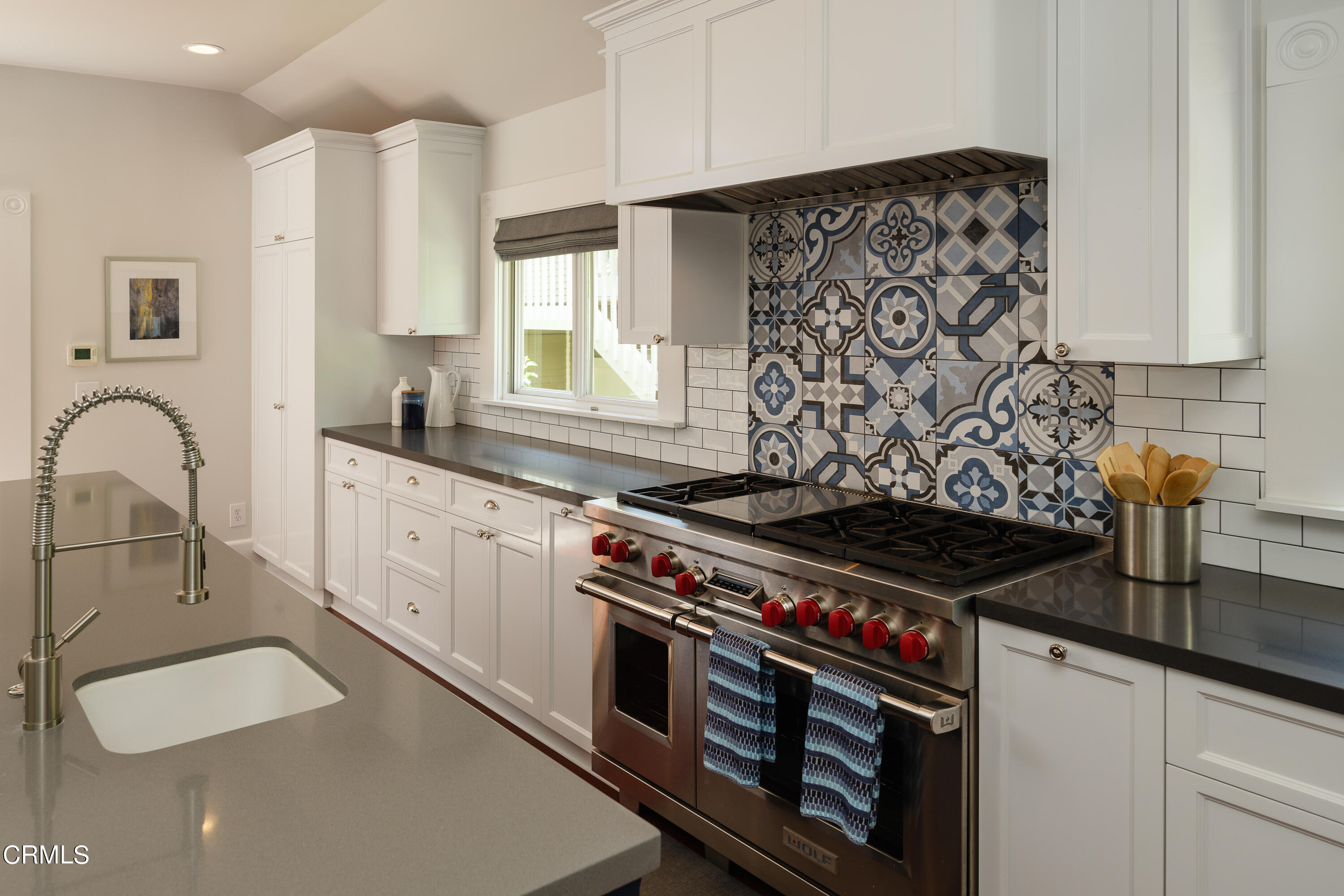 2020 Minoru Drive Altadena, CA 91001 - Photo 27 of 75 a kitchen with granite countertop a stove a sink and a microwave
