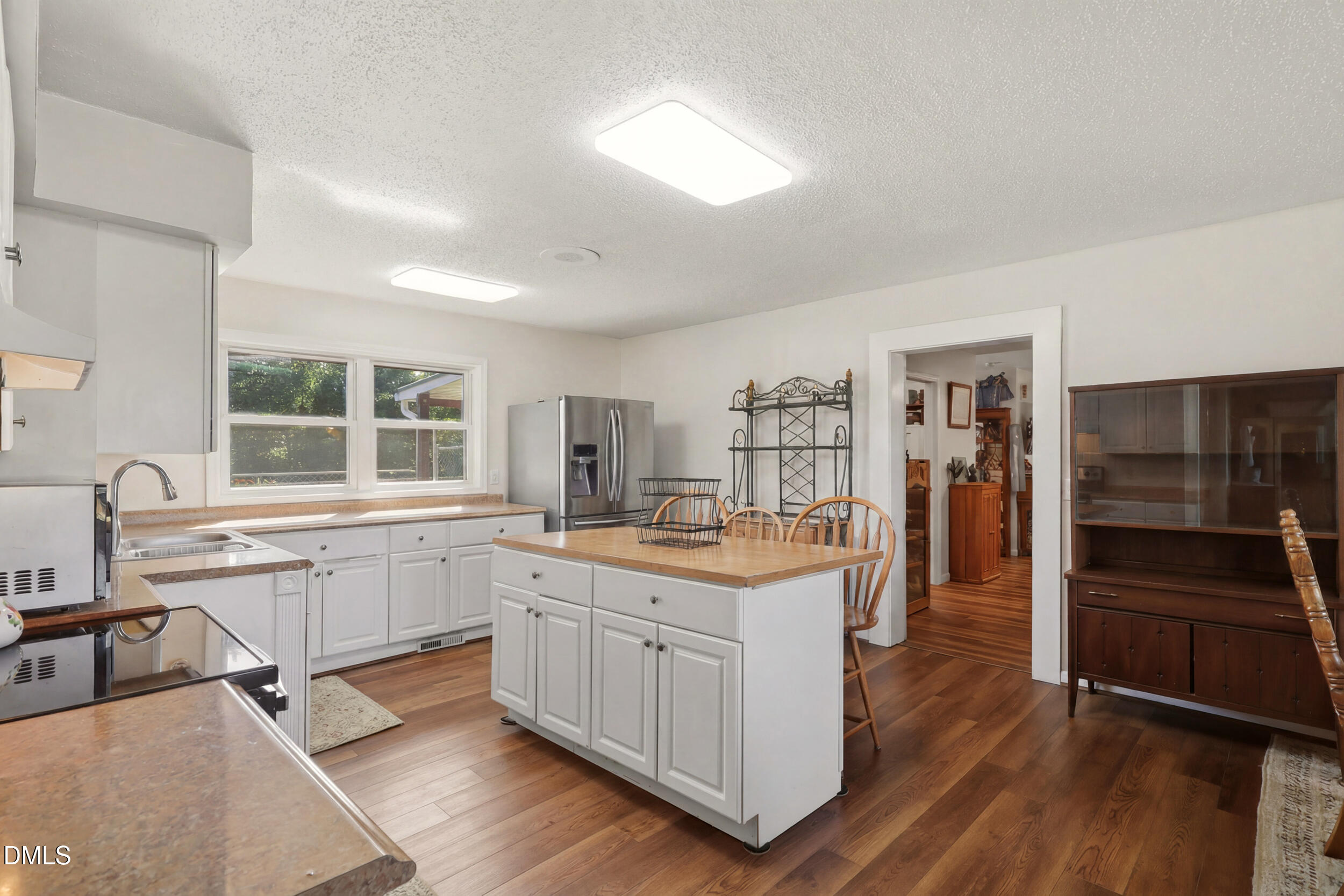 2631 South Jim Minor Road Haw River, NC 27258 - Photo 8 of 62 a kitchen with a sink cabinets and counter space