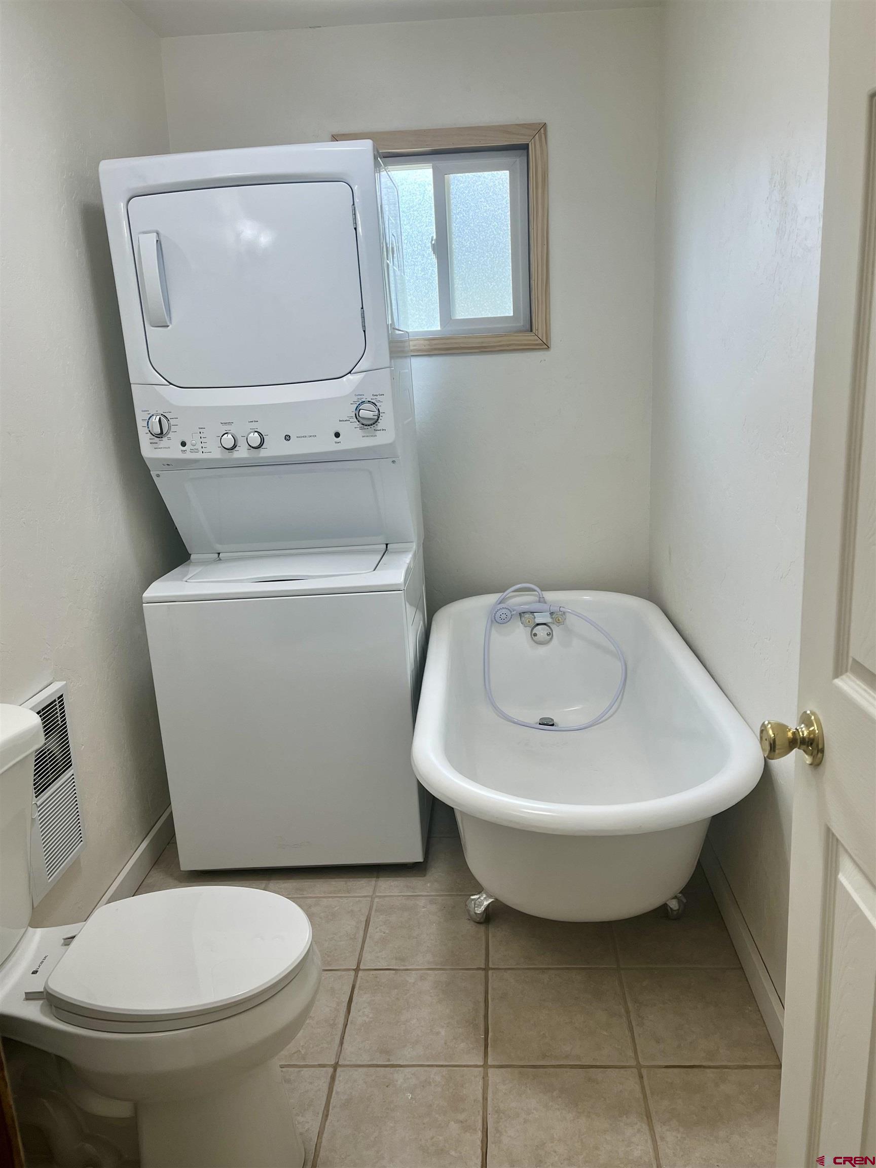 1039 Silver Mesa Driveway Durango, CO 81301 - Photo 20 of 35 a bathroom with a toilet and a sink