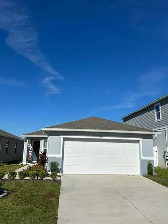 a view of backyard with seating space