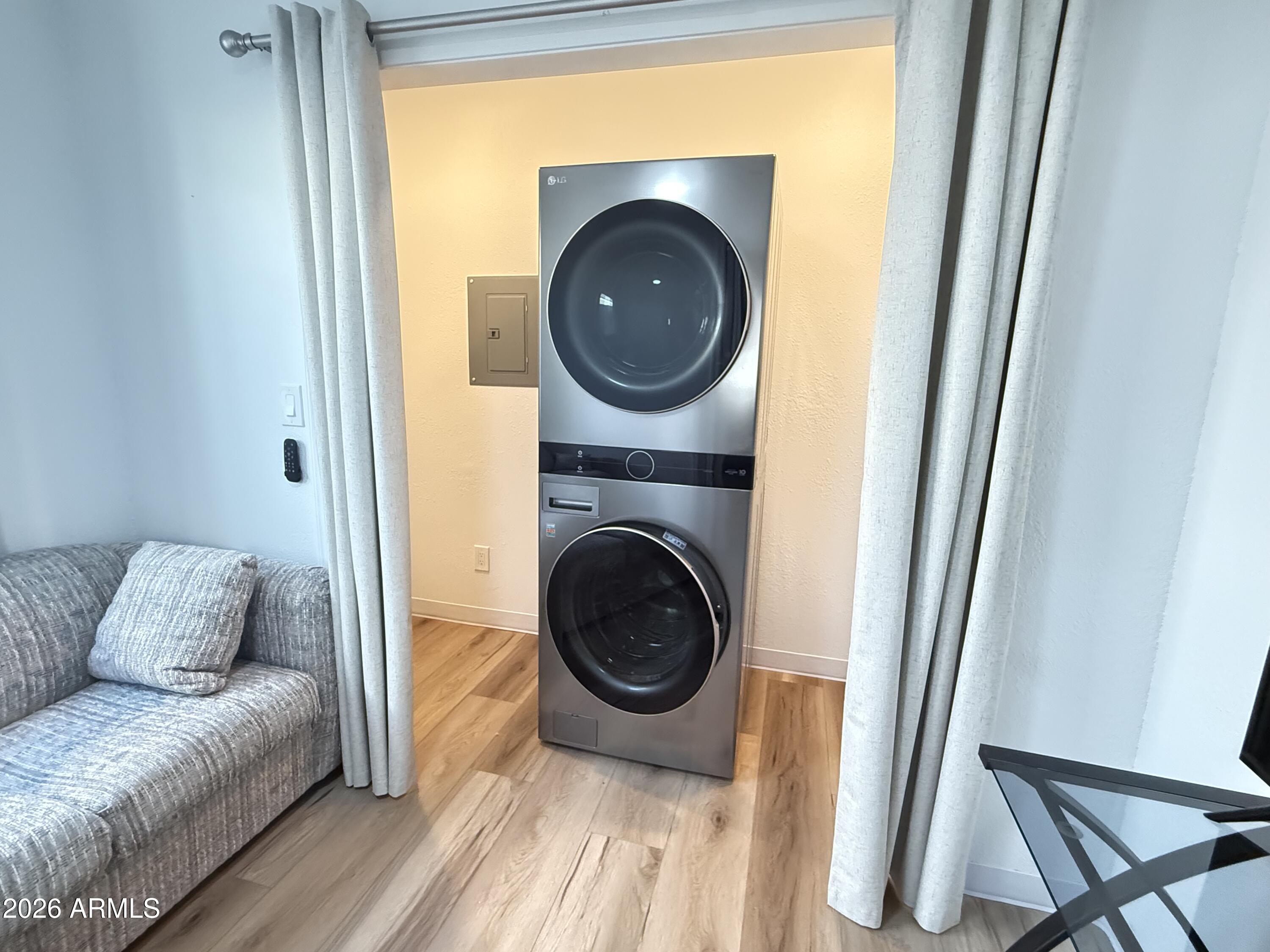 744 Emerald Drive Apache Junction, AZ 85119 - Photo 13 of 25 a living room with furniture and a mirror