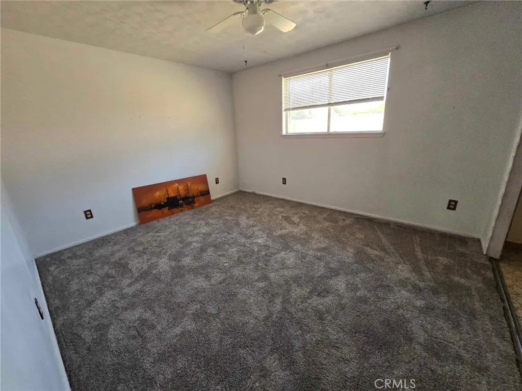 36614 Leona Road Barstow, CA 92311 - Photo 16 of 24 an empty room with windows