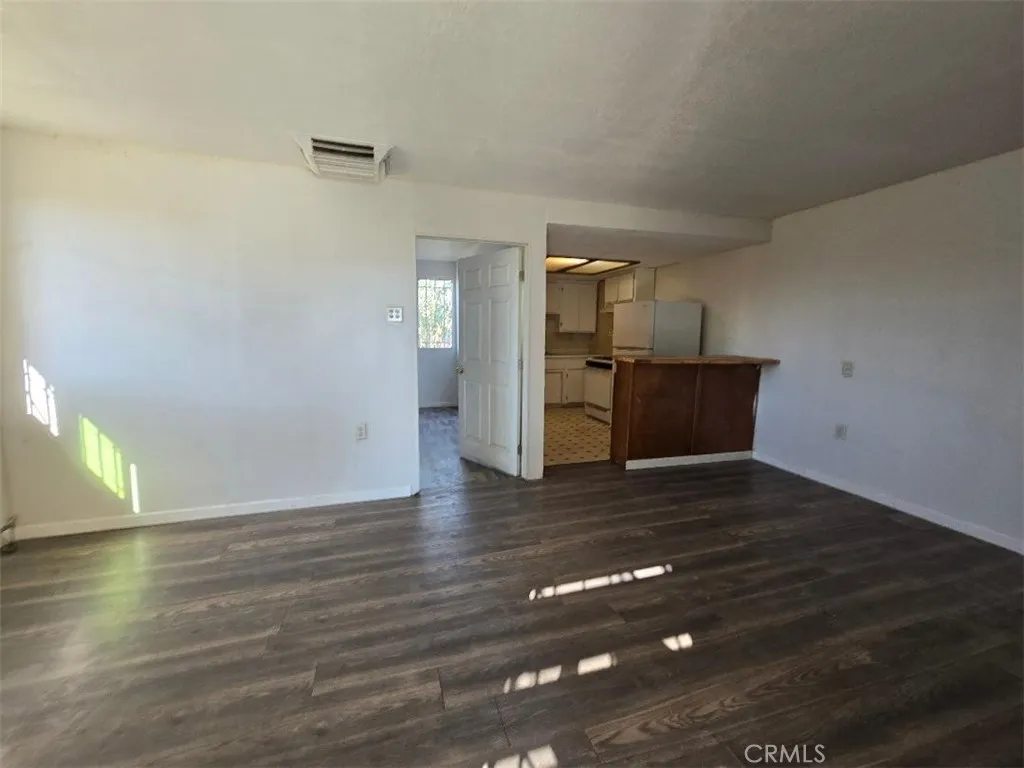 36614 Leona Road Barstow, CA 92311 - Photo 21 of 24 a view of empty room with wooden floor