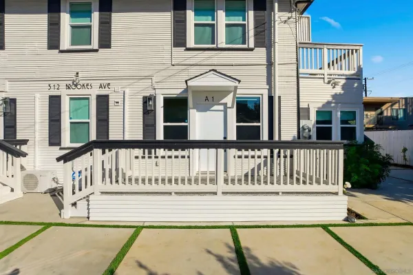 a view of a brick building with a large window