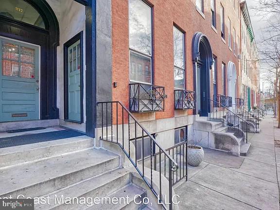 917 North Calvert Street, Unit 6 Baltimore, MD 21202 - Photo 1 of 10 Charming urban brownstone entrance.
