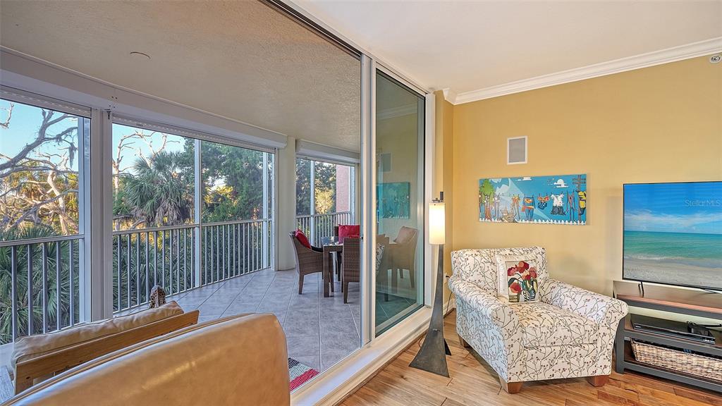 3621 North Point Road, Unit 301 Osprey, FL 34229 - Photo 11 of 95 a living room with couch