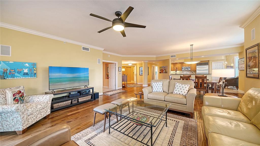3621 North Point Road, Unit 301 Osprey, FL 34229 - Photo 21 of 95 a living room with furniture and a flat screen tv