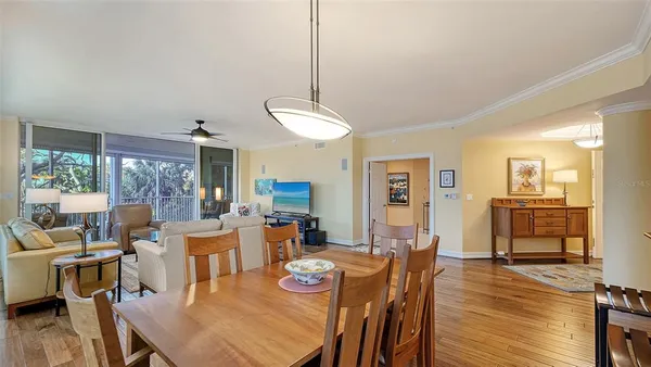 a bedroom with a bed and large window