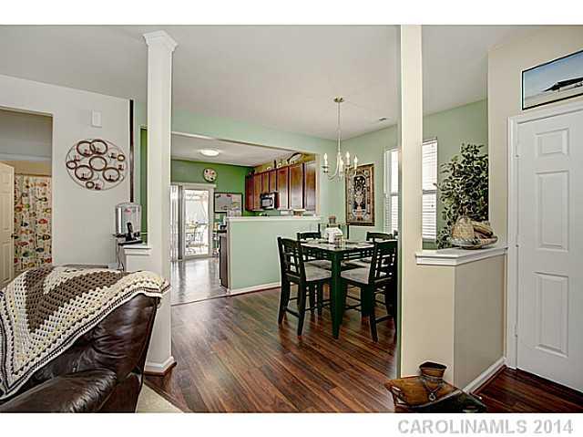 9223 Yellow Oak Road Charlotte, NC 28227 - Photo 3 of 15 a view of a dining room with furniture and wooden floor