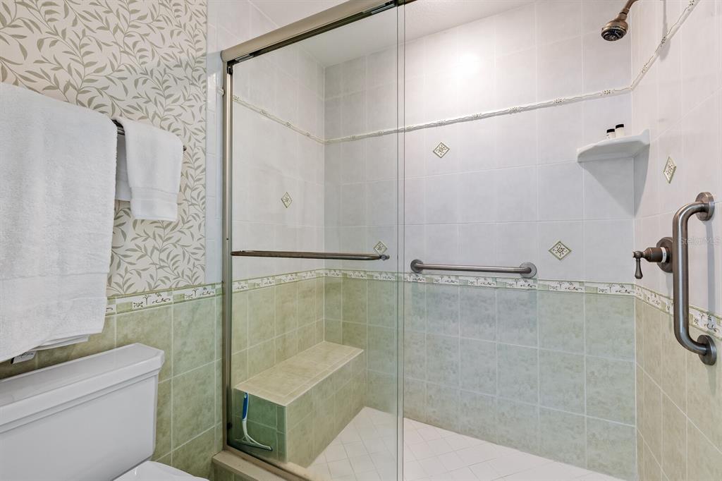 5856 Gasparilla Road, Unit MV28 Boca Grande, FL 33921 - Photo 11 of 21 a bathroom with a shower and a toilet