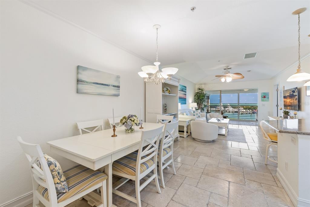 5856 Gasparilla Road, Unit MV28 Boca Grande, FL 33921 - Photo 6 of 21 a view of a dining room with furniture