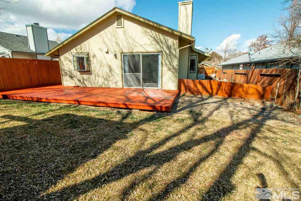 6480 Enchanted Valley Drive Reno, NV 89523 - Photo 12 of 12 a view of a house with a yard