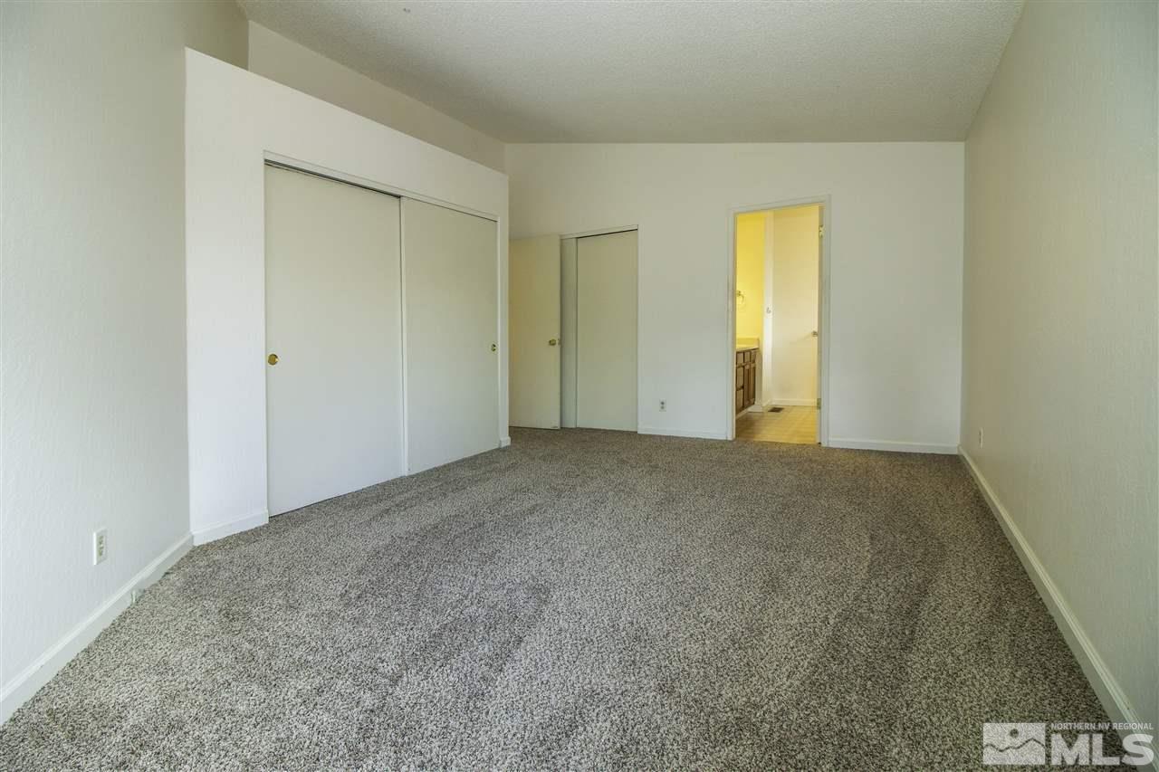6480 Enchanted Valley Drive Reno, NV 89523 - Photo 6 of 12 a view of an empty room and a window