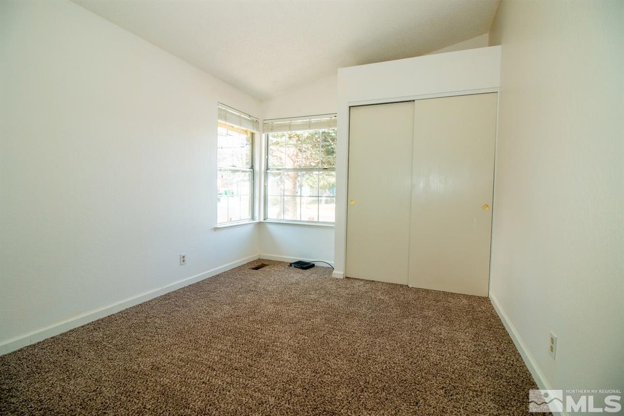 6480 Enchanted Valley Drive Reno, NV 89523 - Photo 8 of 12 a room with windows and closet