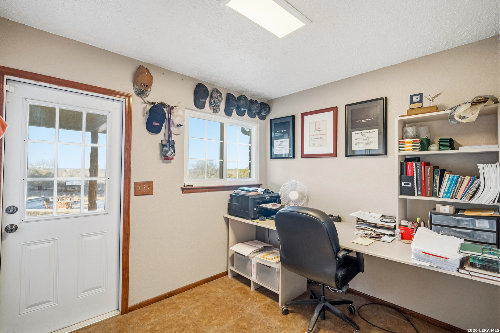 3940 Highway 90 Hondo, TX 78861 - Photo 14 of 24 a view of a workspace with furniture and a window