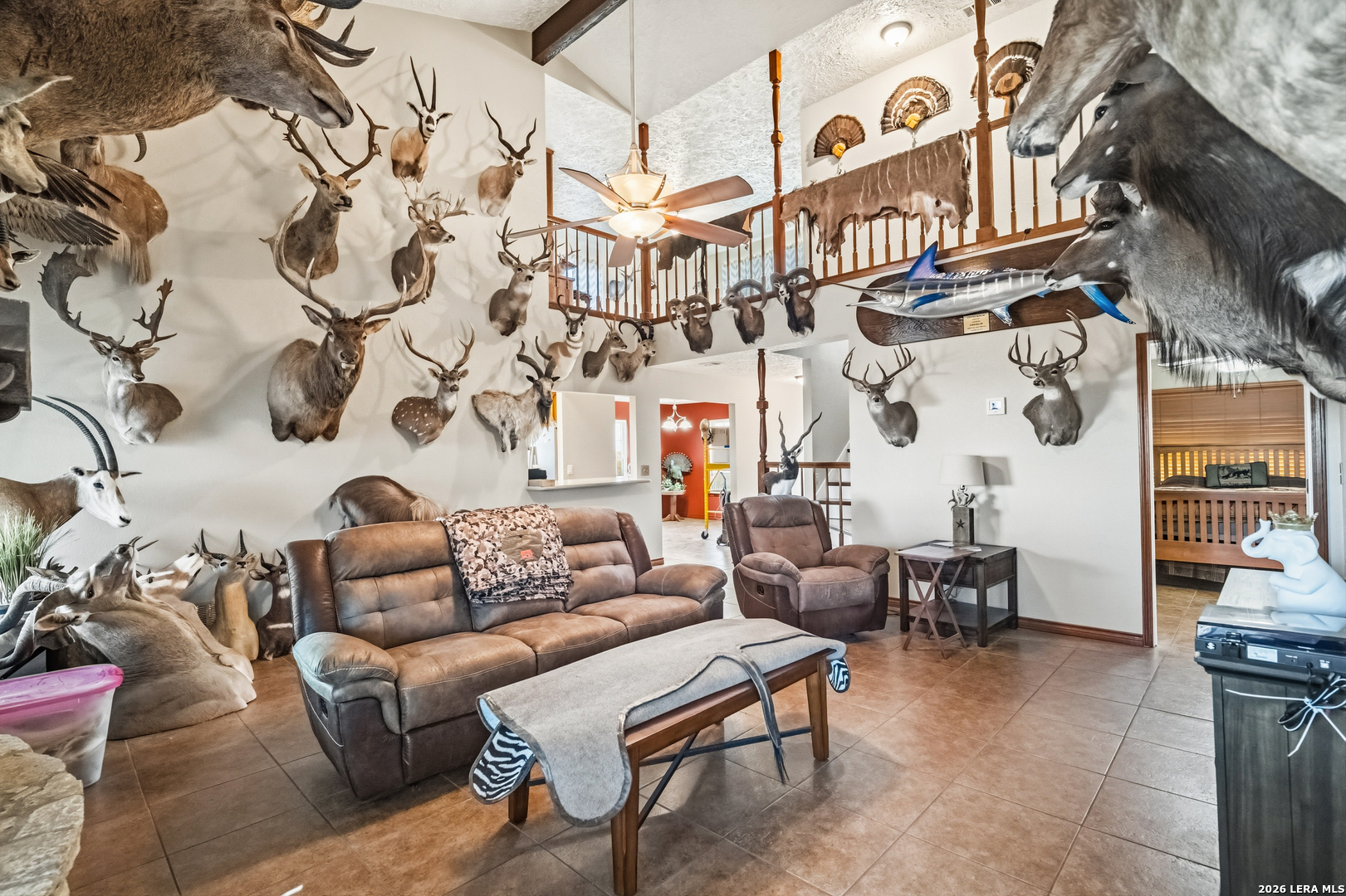 3940 Highway 90 Hondo, TX 78861 - Photo 16 of 24 a living room with furniture and a fireplace