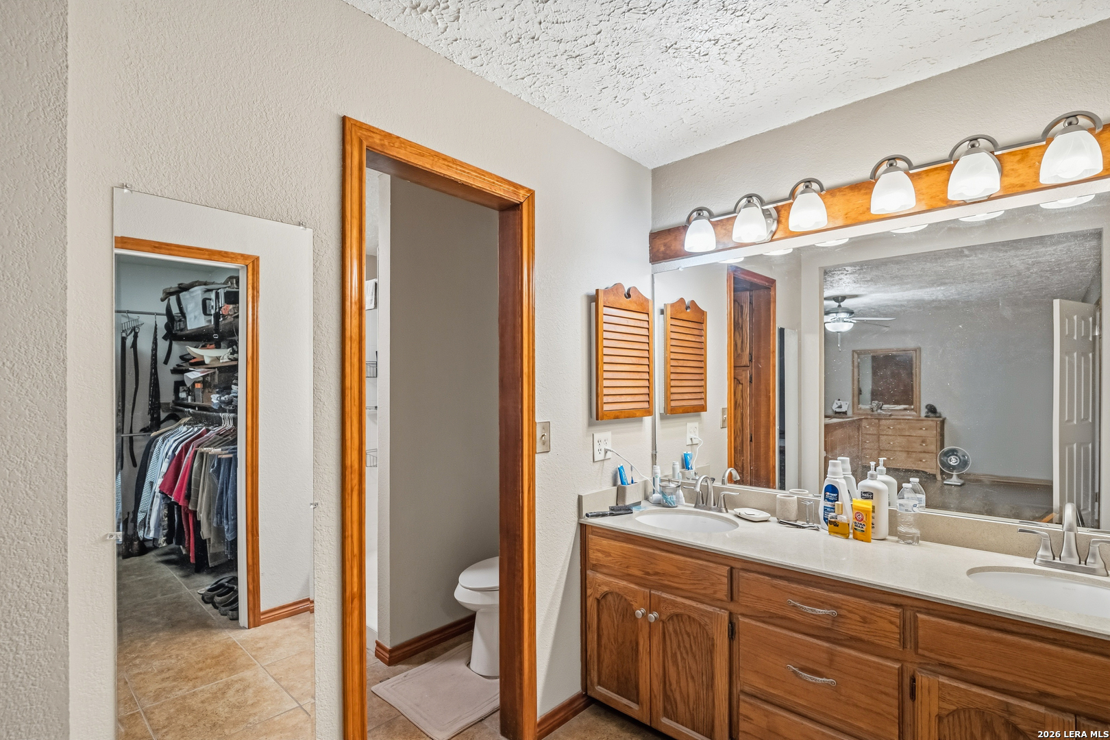 3940 Highway 90 Hondo, TX 78861 - Photo 19 of 24 a en suite bathroom with a sink and a mirror