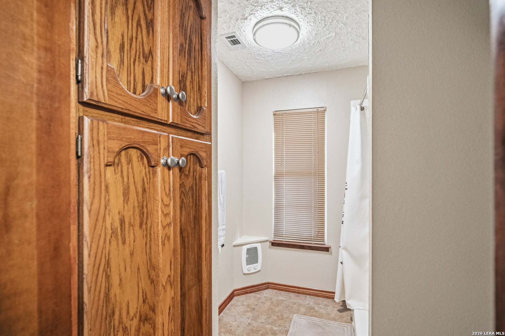 3940 Highway 90 Hondo, TX 78861 - Photo 20 of 24 a bathroom with a granite countertop sink and a mirror