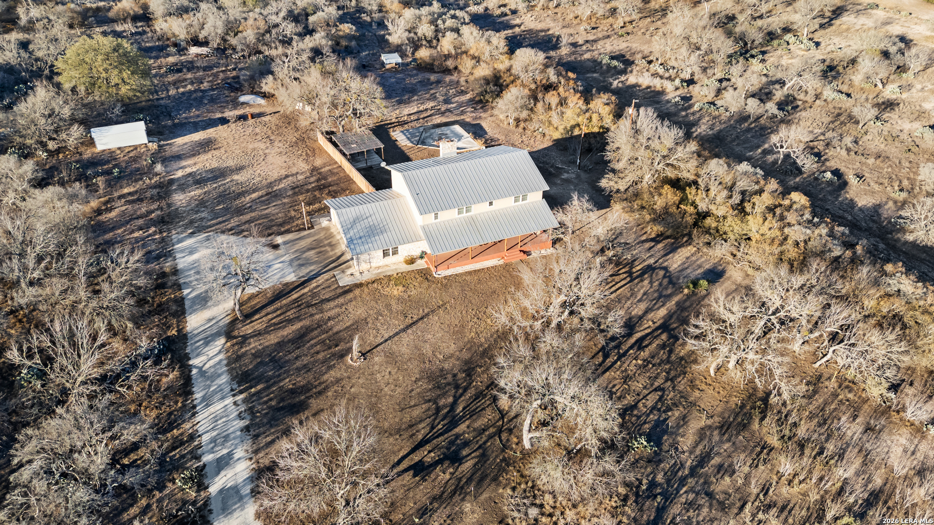 3940 Highway 90 Hondo, TX 78861 - Photo 2 of 24 an aerial view of a house with a yard