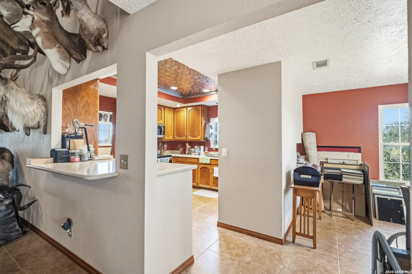 3940 Highway 90 Hondo, TX 78861 - Photo 10 of 24 a kitchen with stainless steel appliances granite countertop a stove and a refrigerator