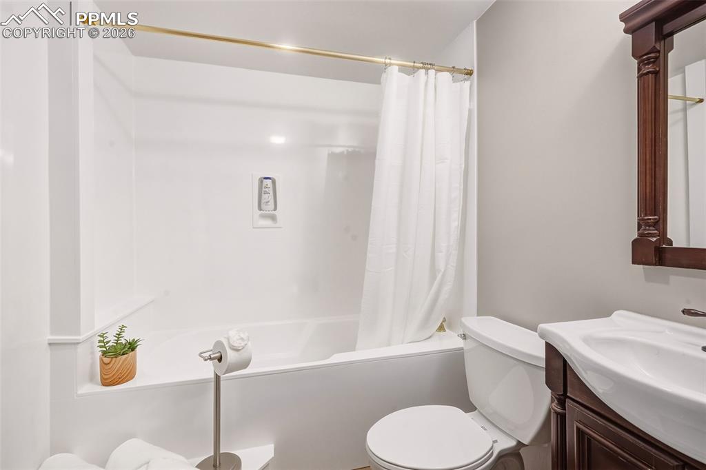 2771 Rigel Drive Colorado Springs, CO 80906 - Photo 35 of 50 Clean and bright full bath featuring a tub/shower combination with durable surround and updated finishes for easy maintenance.