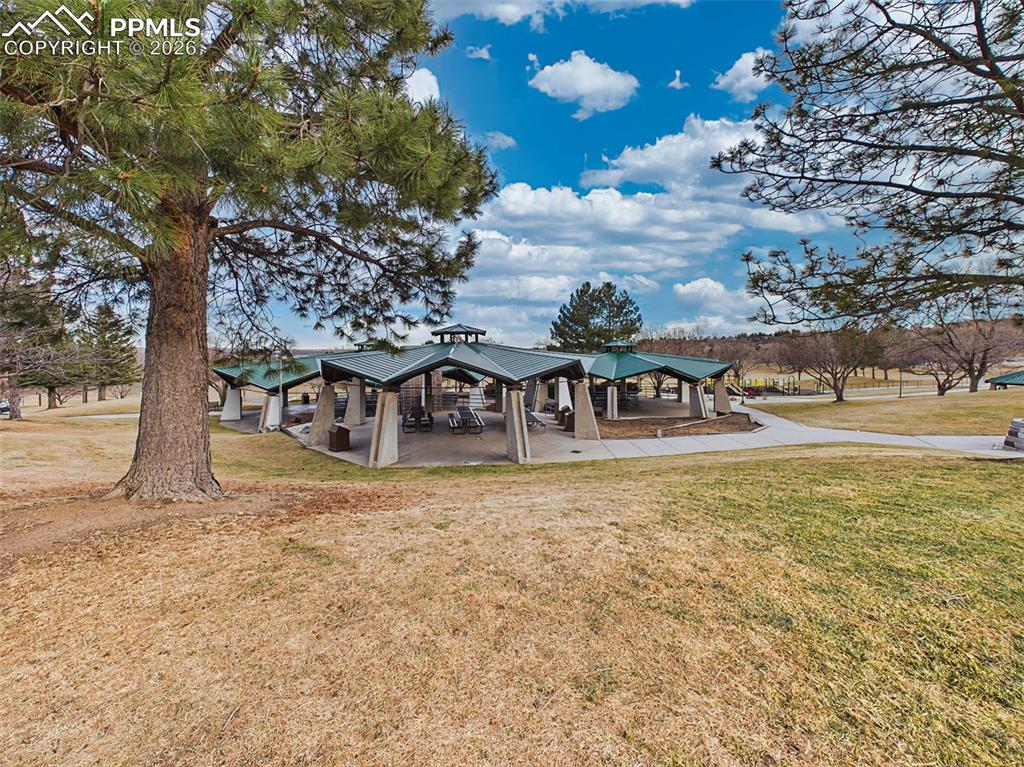 2771 Rigel Drive Colorado Springs, CO 80906 - Photo 50 of 50 Bear Creek Regional Park offers a wide variety of recreational amenities designed for active lifestyles and community enjoyment. The park features tennis and pickleball courts, basketball courts, open sports fields, playground areas, an archery range, and spacious picnic and pavilion spaces ideal for gatherings or outdoor events. Expansive green areas provide room for casual recreation, while the popular dog park offers dedicated fenced spaces for pets to run and socialize. With diverse activity options nea