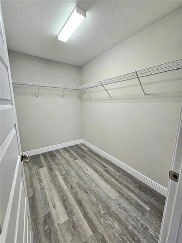 a view of a room with racks on the wall