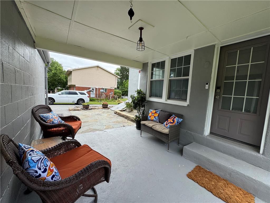 4425 Vera Cruz Road Center Valley, PA 18034 - Photo 11 of 17 An inviting covered porch offers a serene spot for relaxation and outdoor enjoyment.