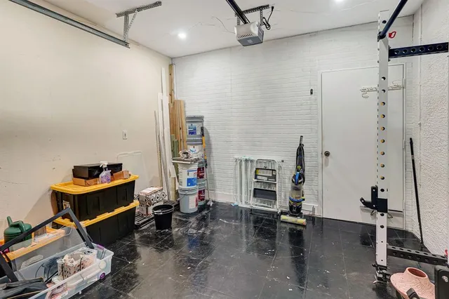 a room with furniture and gym equipment