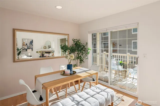 a bedroom with furniture and large window