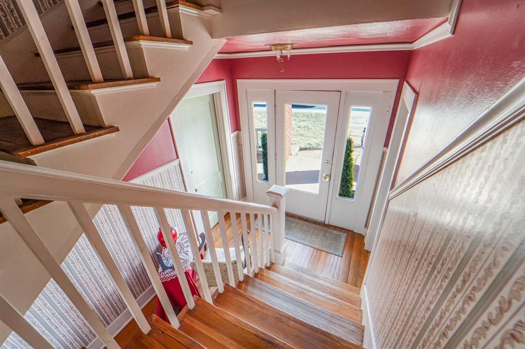 900 West Walker Street Breckenridge, TX 76424 - Photo 24 of 40 a view of an entryway with staircase