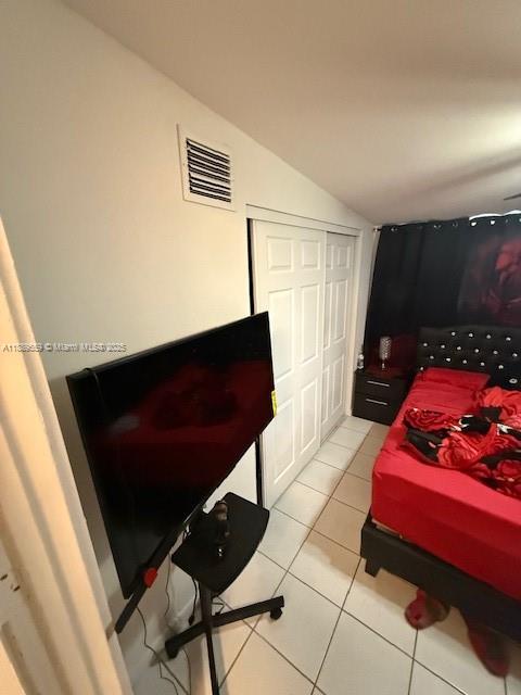 276 East 12th Street Hialeah, FL 33010 - Photo 16 of 25 a living room with furniture and a flat screen tv