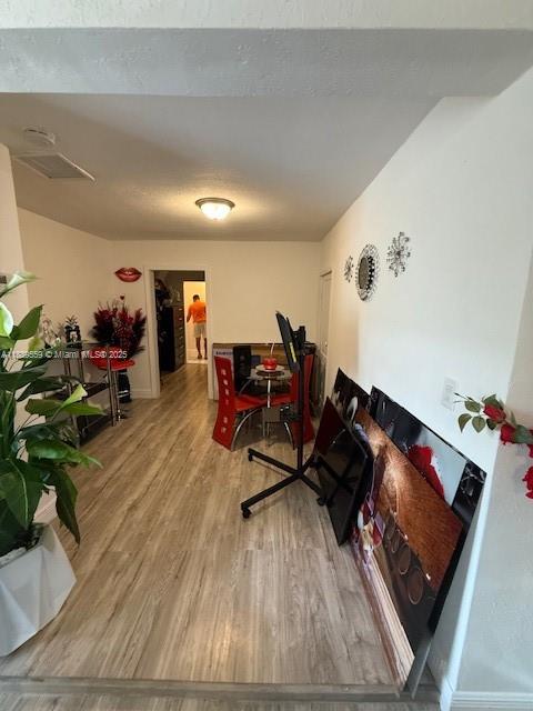 276 East 12th Street Hialeah, FL 33010 - Photo 10 of 25 a living room with furniture and a wooden floor