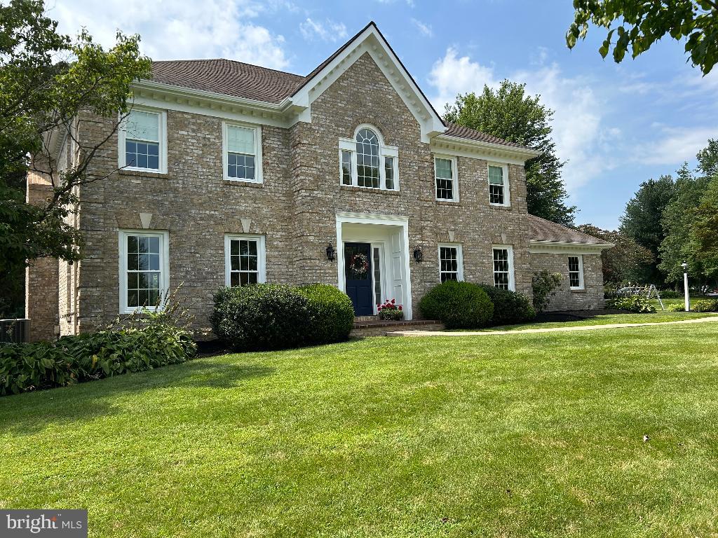 106 Hammersmith Lane Lititz, PA 17543 - Photo 1 of 28 a front view of a house with a yard and garage