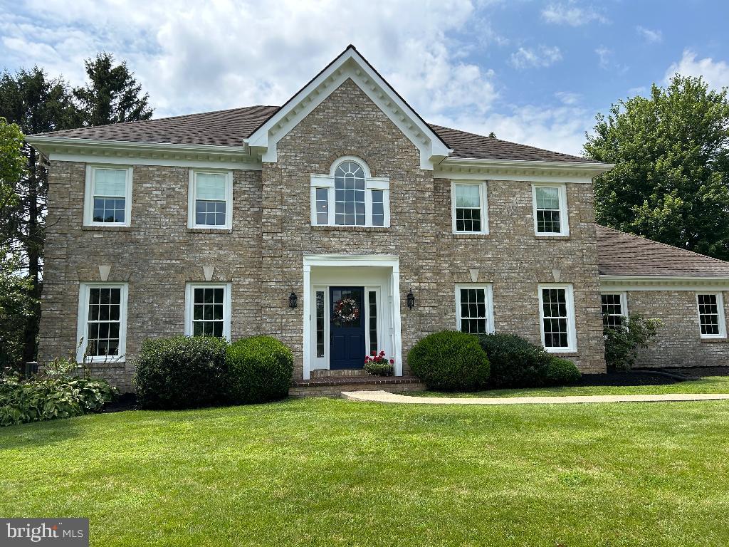 106 Hammersmith Lane Lititz, PA 17543 - Photo 2 of 28 a front view of a house with a garden