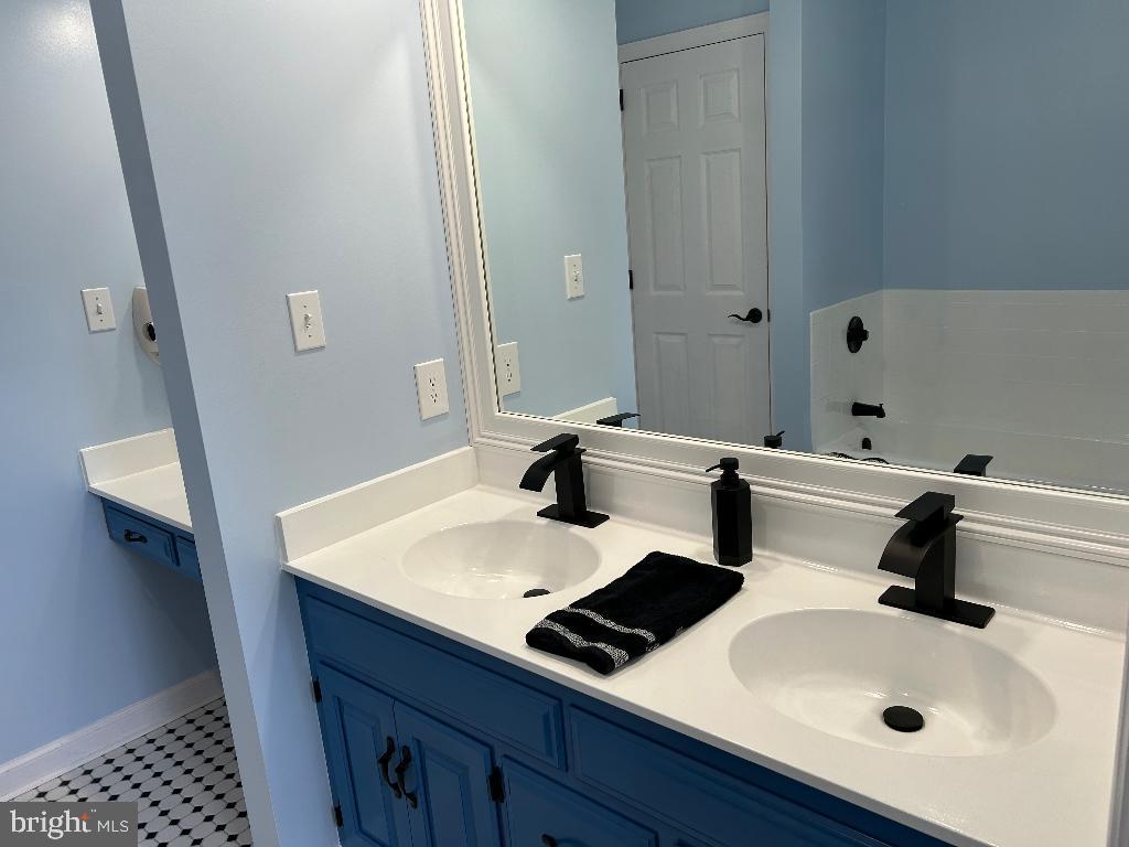 106 Hammersmith Lane Lititz, PA 17543 - Photo 21 of 28 a bathroom with a sink and a mirror