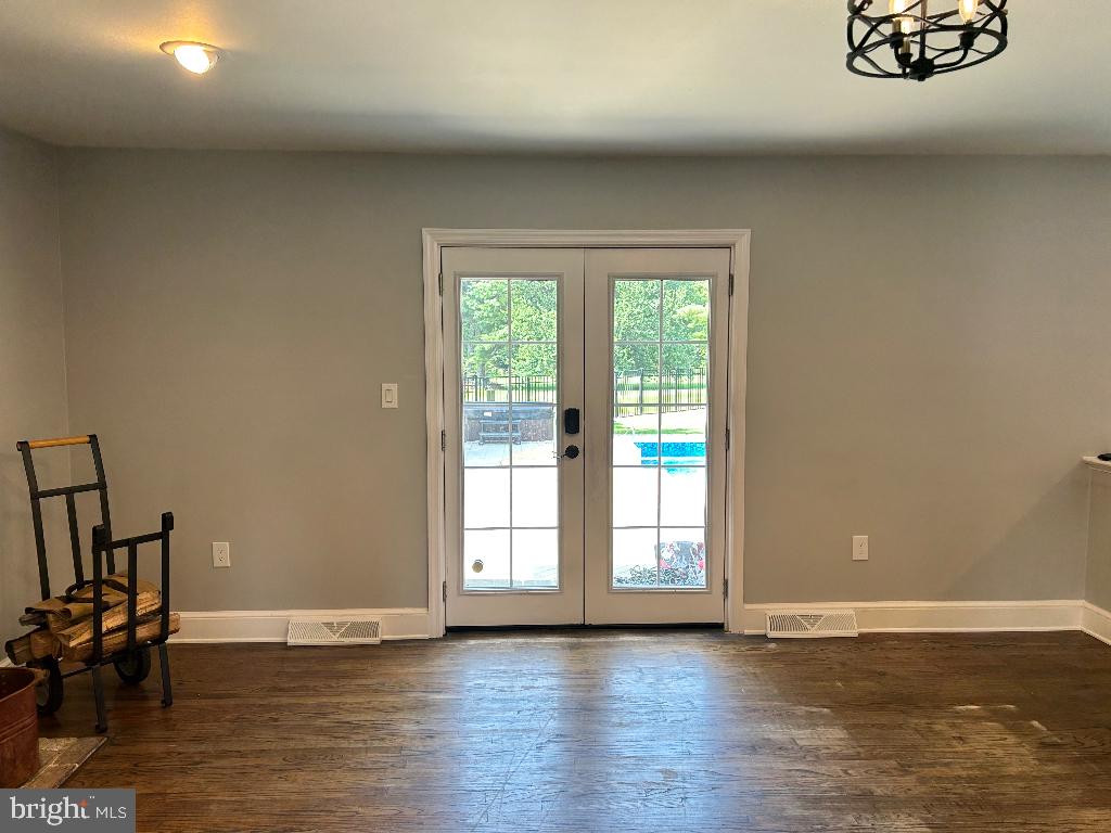 106 Hammersmith Lane Lititz, PA 17543 - Photo 26 of 28 a view of an empty room with wooden floor and a window